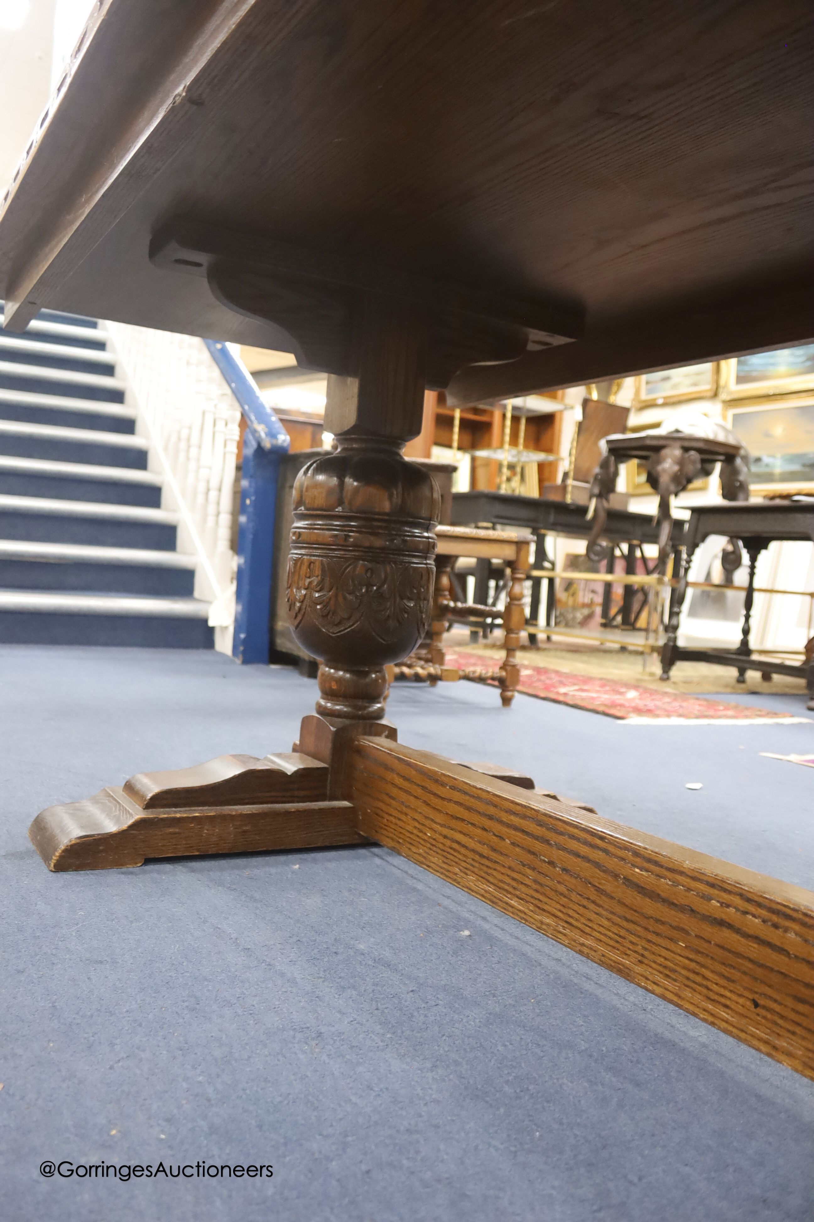 A reproduction 18th century style oak refectory table, width 310cm depth 91cm height 76cm